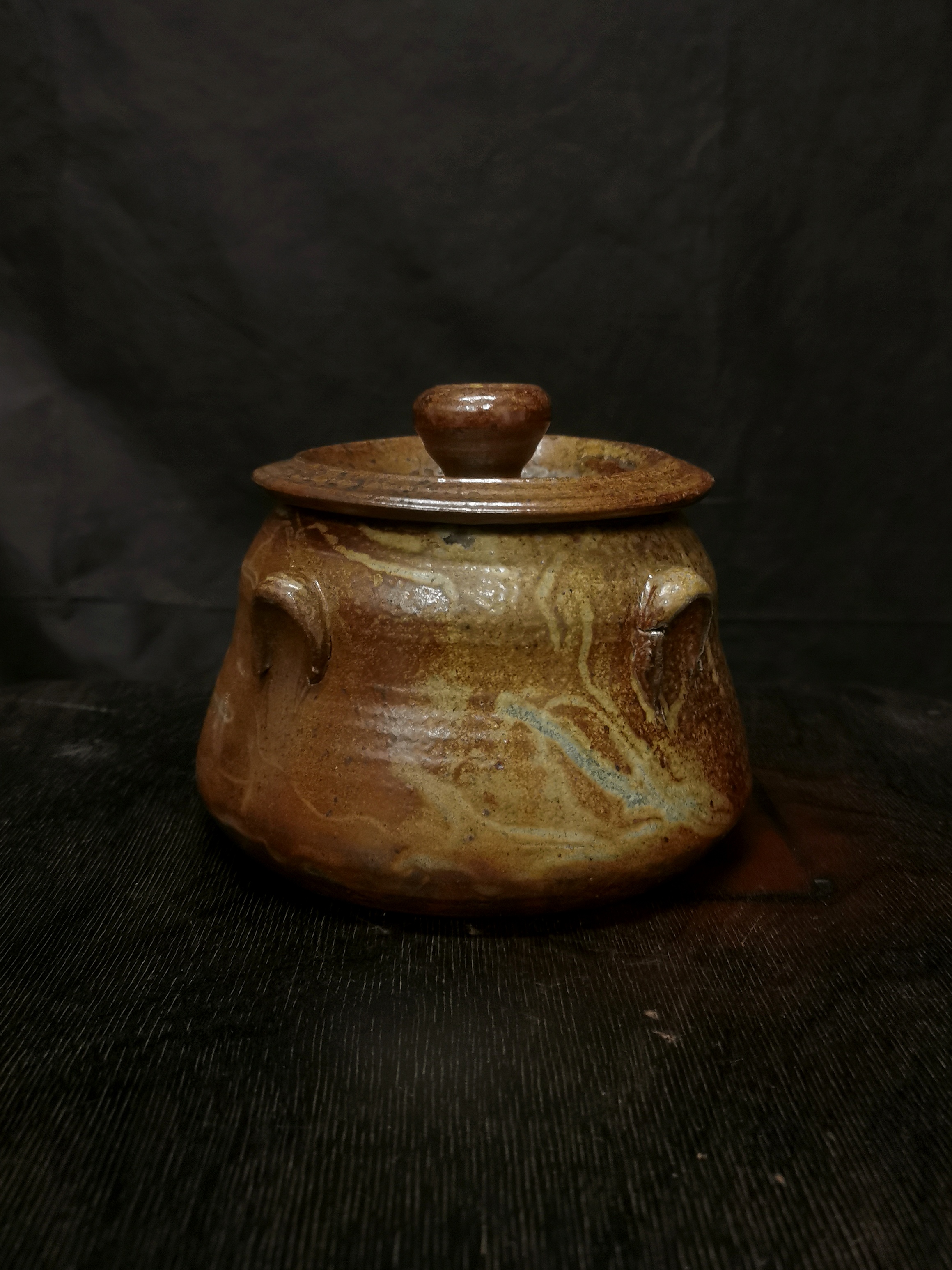 Salt-glazed lidded ceramic jar