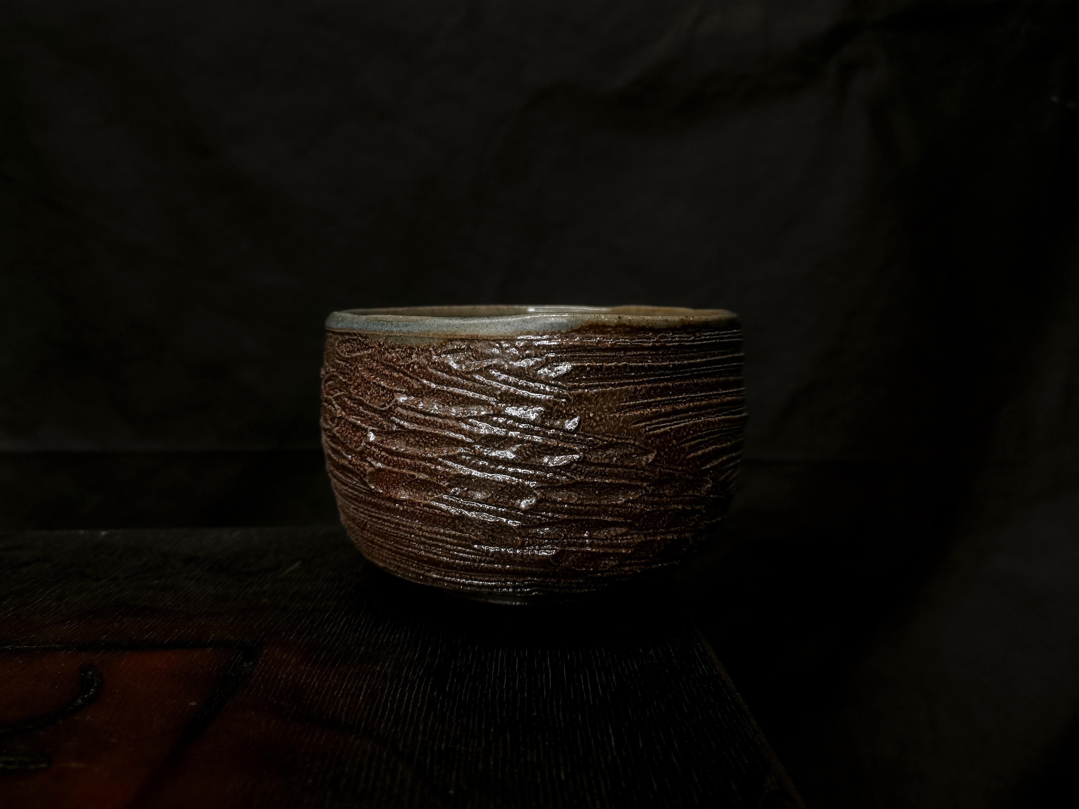 Dark salt-glazed bowl